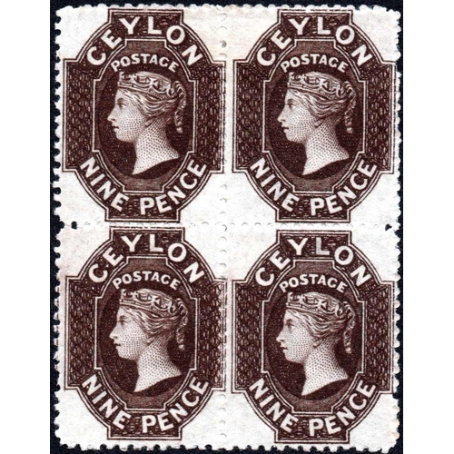 2161 - 1868 9d BLACKISH BROWN. A fine mint block of four, the lower pair unmounted. SG 69b.