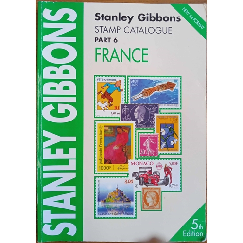 286 - STANLEY GIBBONS: Two boxes containing 'SG Stamps of the World 2004' 4 vols.; Belize, Guyana, and Tri... 