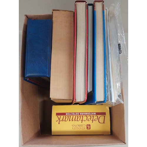 79 - STOCKBOOKS, ALBUMS, LEAVES, WATERMARK DETECTOR ETC.: A box containing two small Lighthouse and one o... 