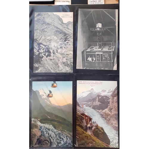 1040 - BERNESE ALPS AND EIGER DISTRICT PPCs, WITH CLIMBERS: Two binders containing a range of cards mainly ... 