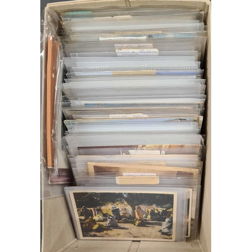 539 - AFRICA: A shoebox containing an ex-dealer's stock of 1900s-1960s, mostly unused cards showing variou... 