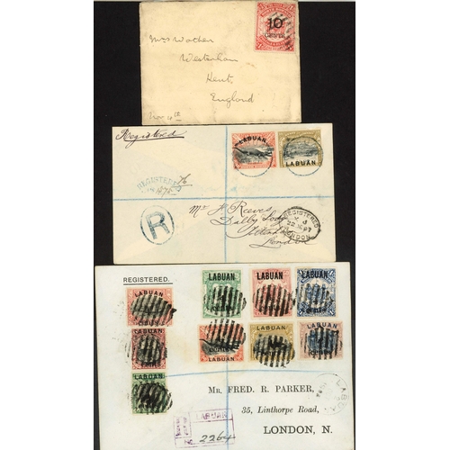 673 - LABUAN &  BRITISH NORTH BORNEO: Group of items on leaves inc BNB postal card green on white with 4c ... 