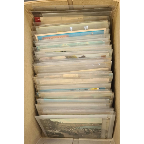 945 - PICTURE POSTCARDS: A shoebox containing an ex-dealer's stock of unused and used cards 1900s-1960s, s... 