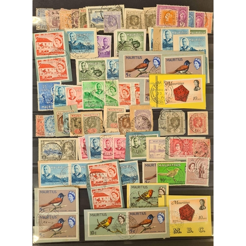 65 - ** POSTMARKS COLLECTION OF 'SMALLER ISLANDS': Two stock books with a collection of stamps, some on p... 