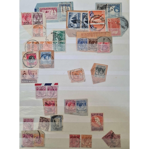 66 - ** BRITISH ASIA CANCELLATIONS: Two stock books housing a duplicated range of Malaya and States on al... 