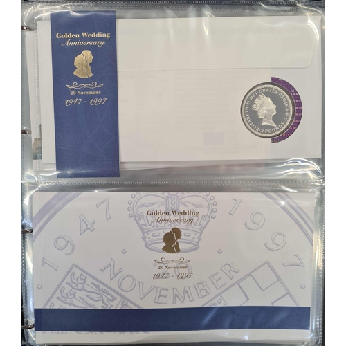 1284 - COIN COVER COLLECTION: Pair of Royal Mail Philatelic Numismatic Cover albums with a 1995-2004 range ... 