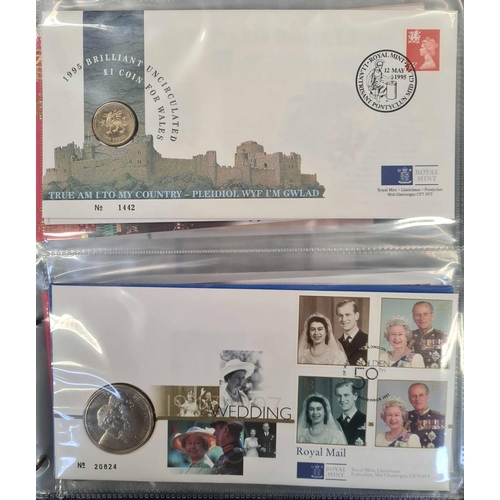 1284 - COIN COVER COLLECTION: Pair of Royal Mail Philatelic Numismatic Cover albums with a 1995-2004 range ... 