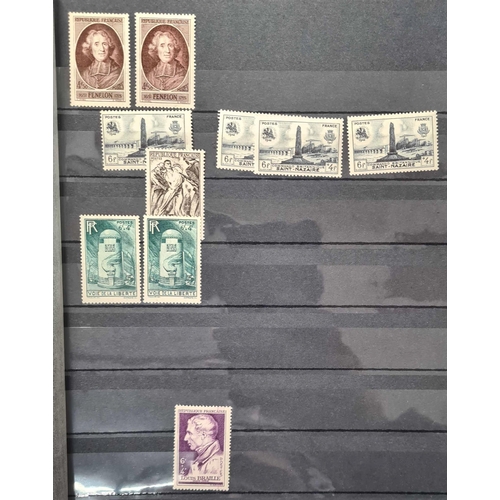 562 - 1900-1970 MINT ACCUMULATION: Five stock books holding a duplicated accumulation of mint issues. Stre... 