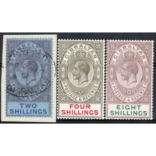 449 - 1921-27 HIGH VALUES; Comprising 2/- used on piece, 4/- & 8/- mounted mint. (SG99-101, £480). (3)