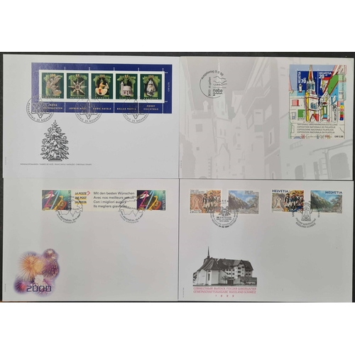 703 - FIRST DAY COVER COLLECTION 1971-2010: A carton containing five albums illustrated unaddressed FDC's,... 