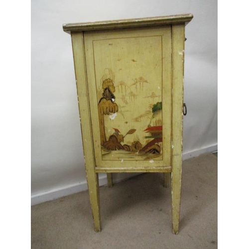 201 - An early 20th century chinoiserie decorated and cream painted bedside cabinet, with a panelled door,... 