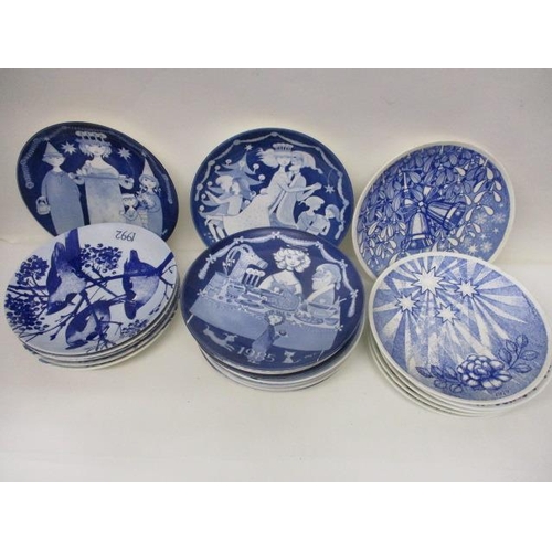 208 - Twenty one Gustavsberg china year plates, each decorated in blue and white with scenes, 1974-1994, 8... 