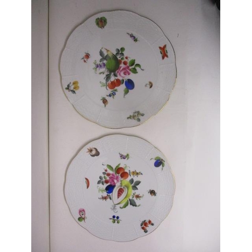 216 - A pair of Herend porcelain cake plates, decorated with fruit and nuts with a blue back stamp, 10 1/2... 