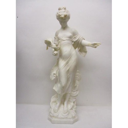 238 - A late 19th century carved white alabaster figure of a woman holding a small pedestal bowl, with a b... 