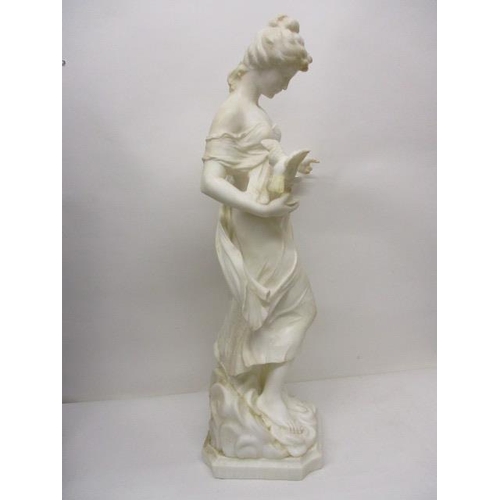 238 - A late 19th century carved white alabaster figure of a woman holding a small pedestal bowl, with a b... 