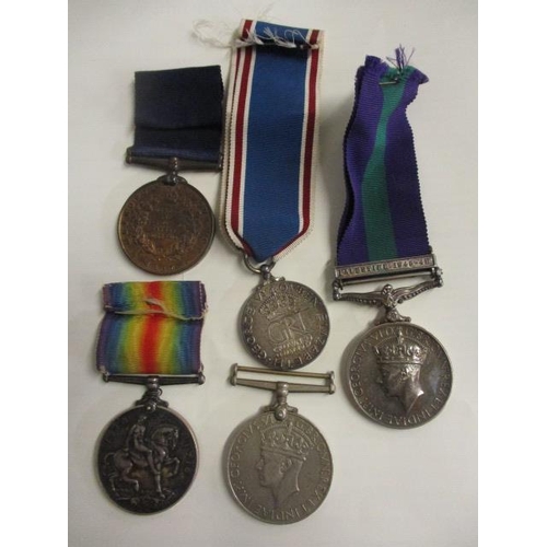 74 - A General Service Palestine medal, a WW1 British War medal Heart regiment, a WW2 British war medal, ... 