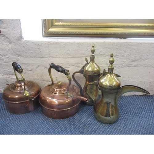 76 - Two 20th century Middle Eastern brass pots, together with two Victorian copper kettles