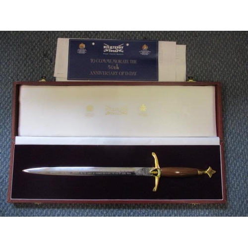 80 - A cased commemorative Wilkinson Sword to commemorate The Allied Landing on The Coast of France on D-... 