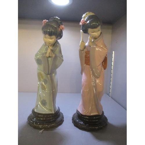 88 - Two Lladro figures of Geisha girls