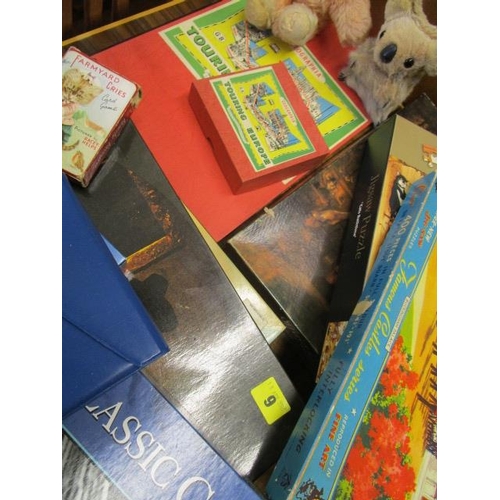 9 - A group of soft toys to include a dog and a koala bear, and a quantity of puzzles and board games