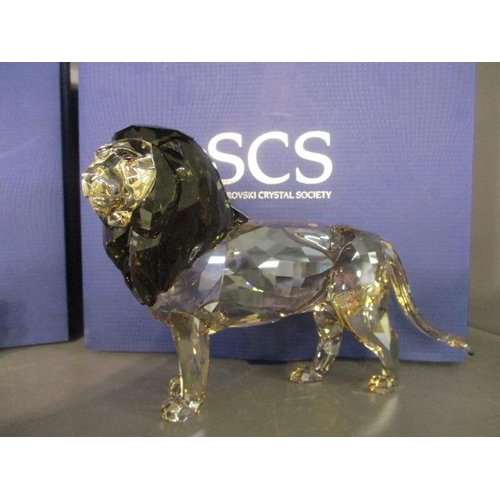 94 - A boxed Swarovski Crystal Society model entitled Lion Akill