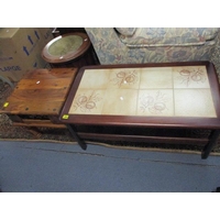 A mid 20th century mahogany work table with contents to include vintage  tobacco tins and cotton reel