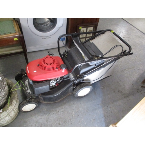 428 - A Honda petrol driven rotary lawnmower