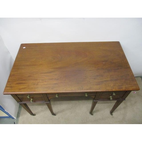 126 - A Victorian mahogany and marquetry desk having a drawer flanked by four drawers, with scrolled folia... 