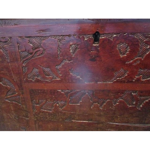 194 - WITHDRAWN  An 18th century continental boarded fruit wood chest having a hinged plank top, over a ca... 