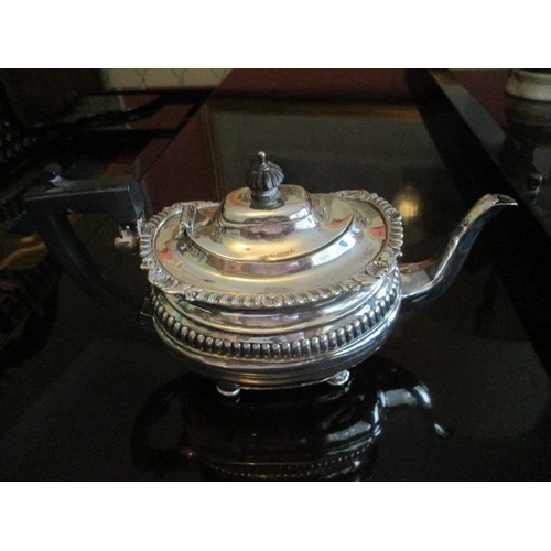 195 - WITHDRAWN  A Victorian silver teapot, Chester, marks rubbed with gadrooned, shell and bead ornament ... 