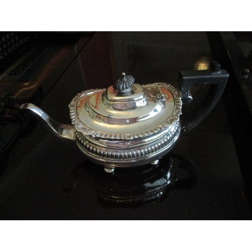 195 - WITHDRAWN  A Victorian silver teapot, Chester, marks rubbed with gadrooned, shell and bead ornament ... 