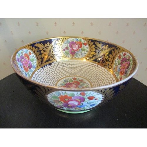 196 - WITHDRAWN  An early 19th century Minton bowl decorated with a blue band and floral painted reserve p... 