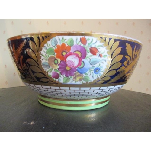 196 - WITHDRAWN  An early 19th century Minton bowl decorated with a blue band and floral painted reserve p... 