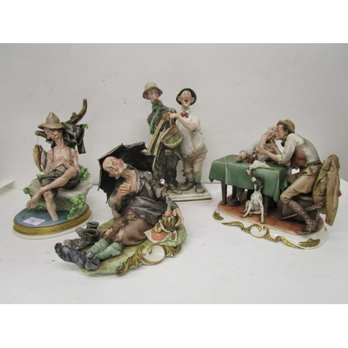 201 - A group of four Galli Capodimonte figurines to include one of two fishermen, a fisherman asleep afte... 