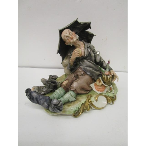 201 - A group of four Galli Capodimonte figurines to include one of two fishermen, a fisherman asleep afte... 