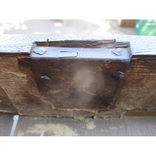 206 - An early 18th century walnut chest on stand having a quarter veneered, crossbanded top over two shor... 