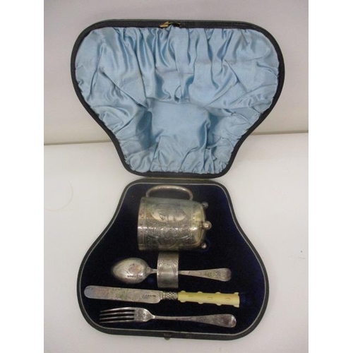 223 - A Victorian silver five piece christening set by Walker & Hall, Sheffield 1885/1886, comprising a mu... 