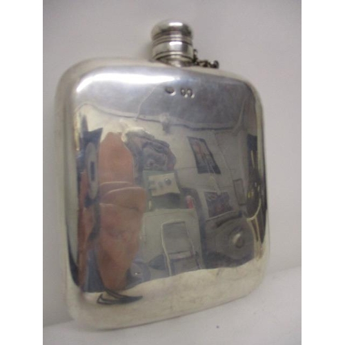 244 - A Victorian hip flask by William Summers, London 1864 of curved, rectangular, cushion form with a sc... 