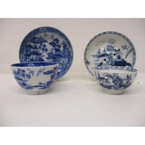 274 - A late 18th century, possibly Liverpool, blue and white tea bowl and saucer decorated with buildings... 