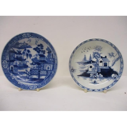 274 - A late 18th century, possibly Liverpool, blue and white tea bowl and saucer decorated with buildings... 