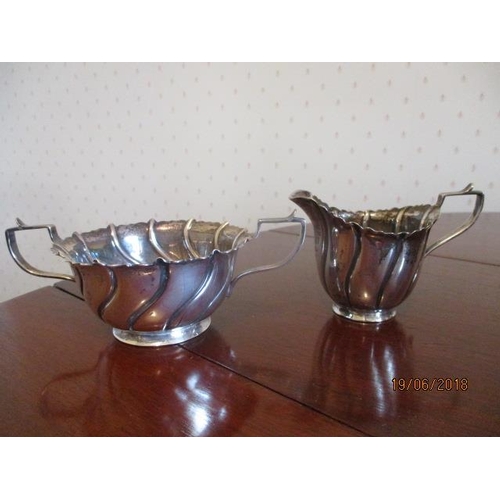 288 - WITHDRAWN  A late Victorian Irish silver sugar bowl and milk jug by Goldsmith and Silversmiths Compa... 