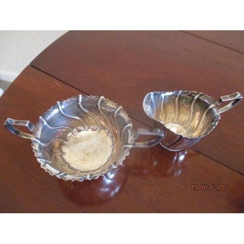 288 - WITHDRAWN  A late Victorian Irish silver sugar bowl and milk jug by Goldsmith and Silversmiths Compa... 