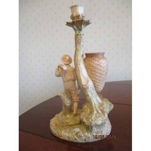 290 - WITHDRAWN  A late Victorian Royal Worcester, blush ivory glazed, porcelain candelabra with a stem fa... 