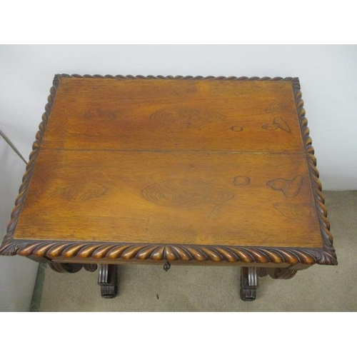 297 - A William VII rosewood work table, the top having a gadrooned edge over a drawer, a slide and C scro... 