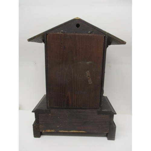 65 - A late 19th century Black Forest, oak, carved cuckoo clock, the movement signed G H S for Gordian He... 