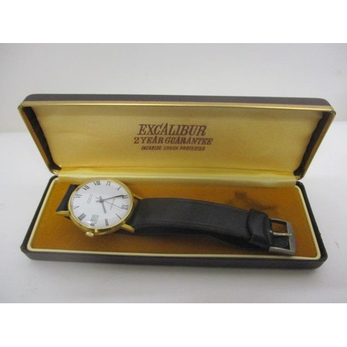 7 - An Excalibur gents, manual wind, gold plated, 17 jewel Incabloc wristwatch having a white enamel dia... 