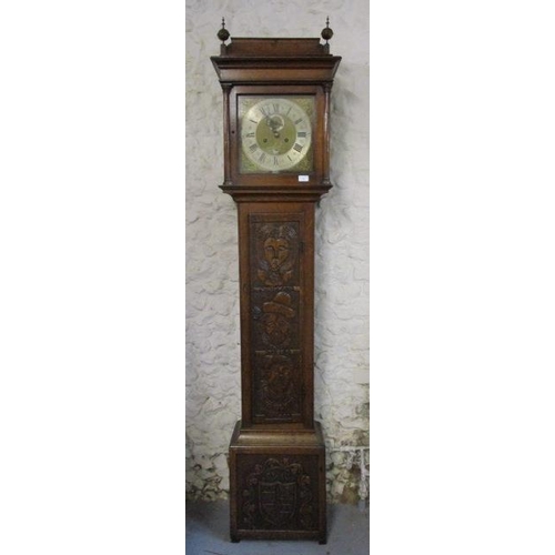 77 - An early 18th century oak longcase clock, with eight day strike on bell movement, regulated by a pen... 