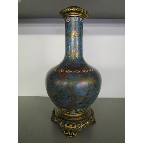 265 - A 19th century cloisonne enamelled bottle vase decorated with goats and a sheep, in a floral and tre... 