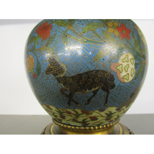 265 - A 19th century cloisonne enamelled bottle vase decorated with goats and a sheep, in a floral and tre... 