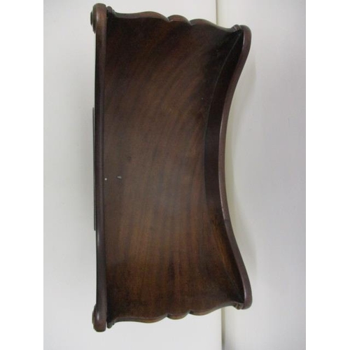 272 - A George III mahogany cheese coaster with turned handles, on a rectangular base, 7